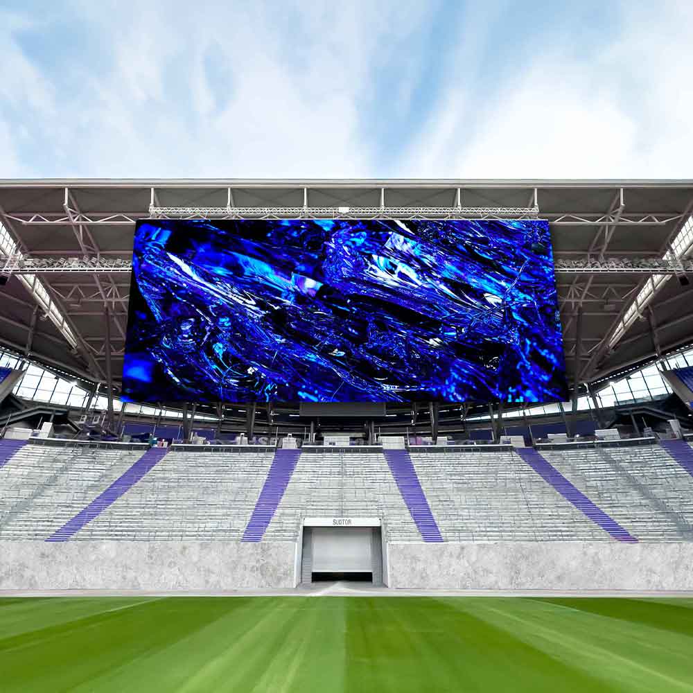 Ein leerer Stadionbildschirm zeigt ein abstraktes blaues Design, keine Personen sichtbar.